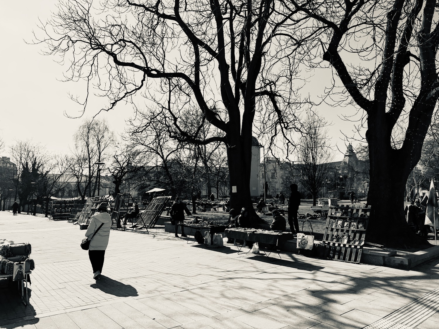 a person walking on a sidewalk