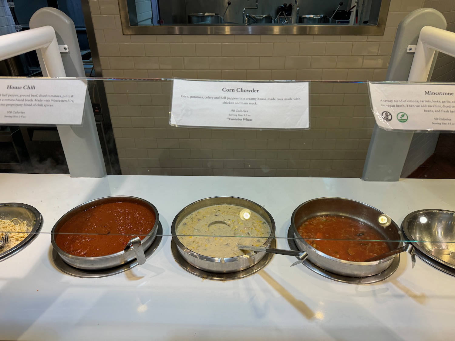 bowls of soups in bowls on a counter