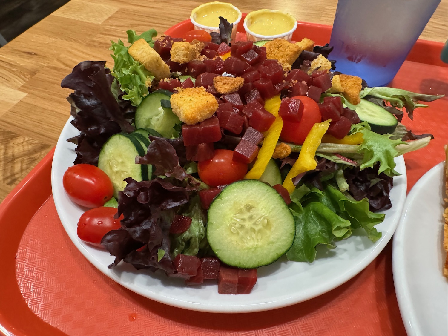 a plate of salad on a table