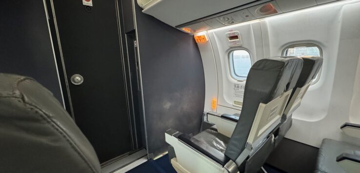 an airplane with seats and a door
