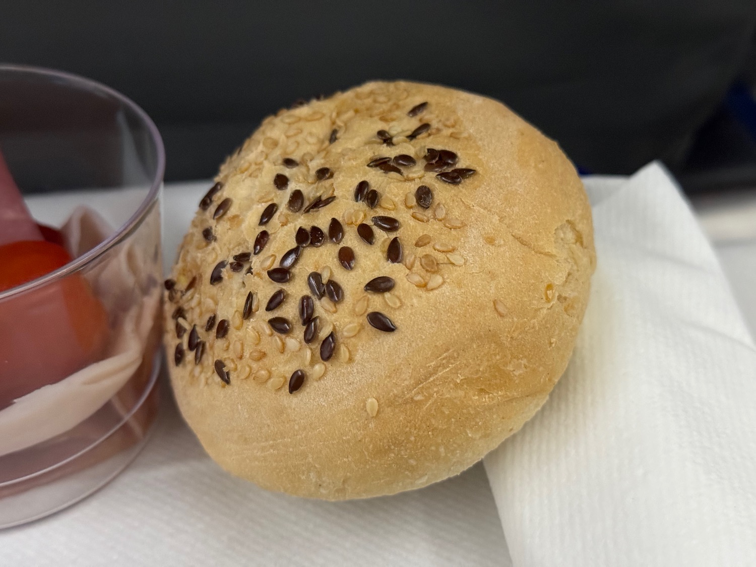 a bun with seeds on top