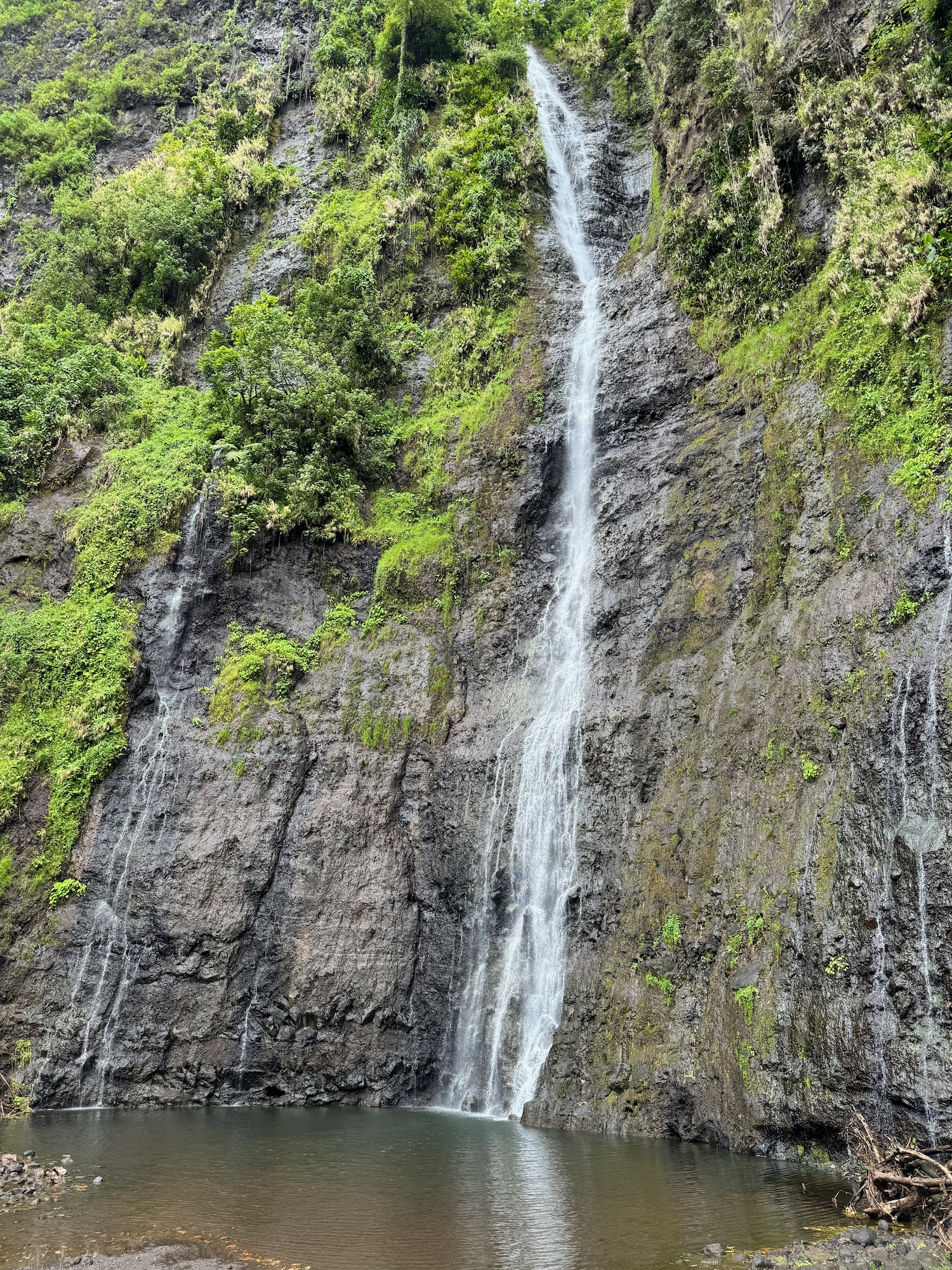 a waterfall on a cliff