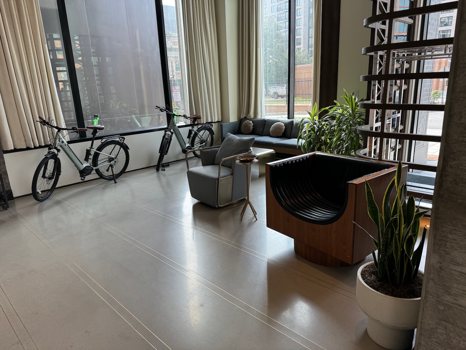 a room with a couch and a bicycle