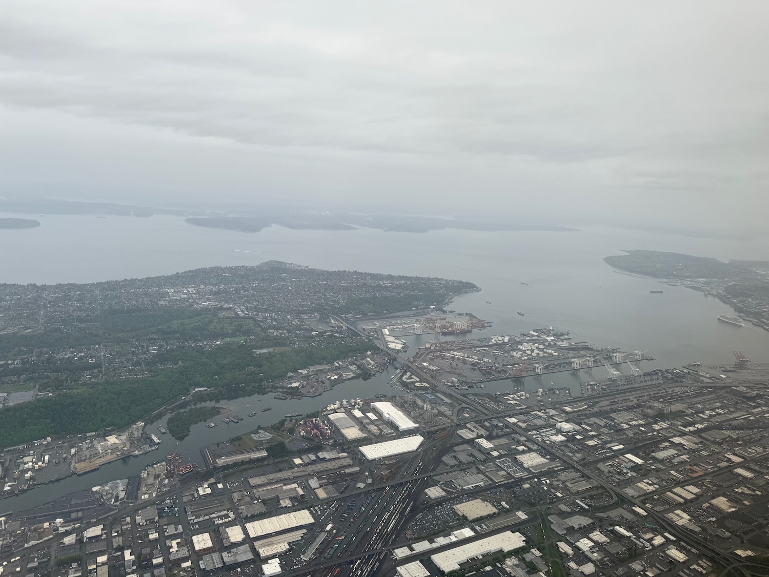 an aerial view of a city and water