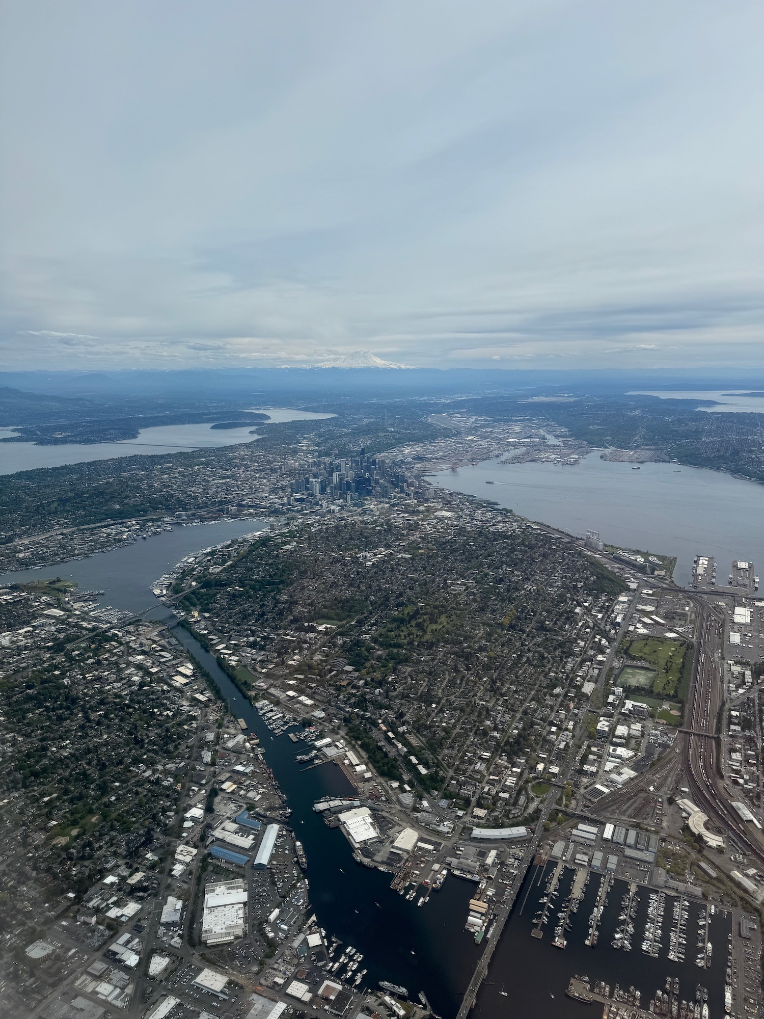 an aerial view of a city and water