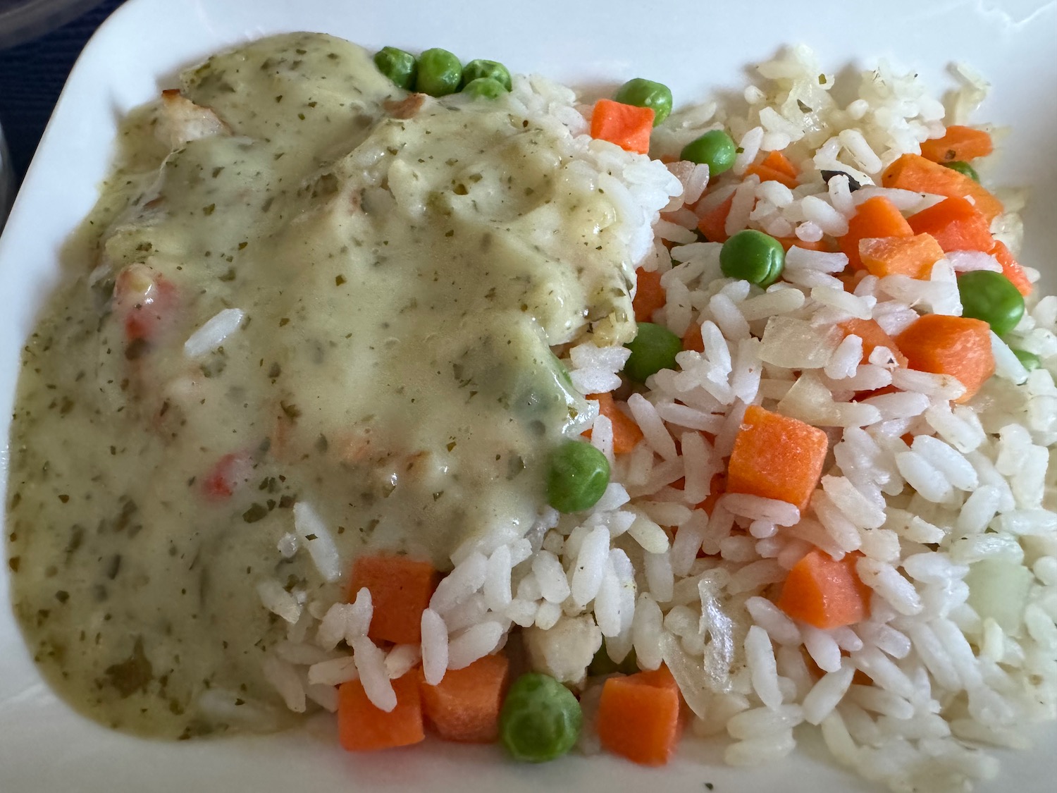 a plate of rice and vegetables