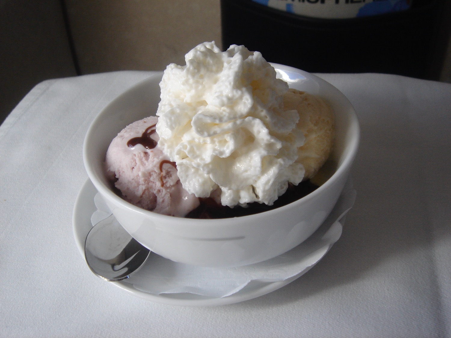 a bowl of ice cream with a spoon