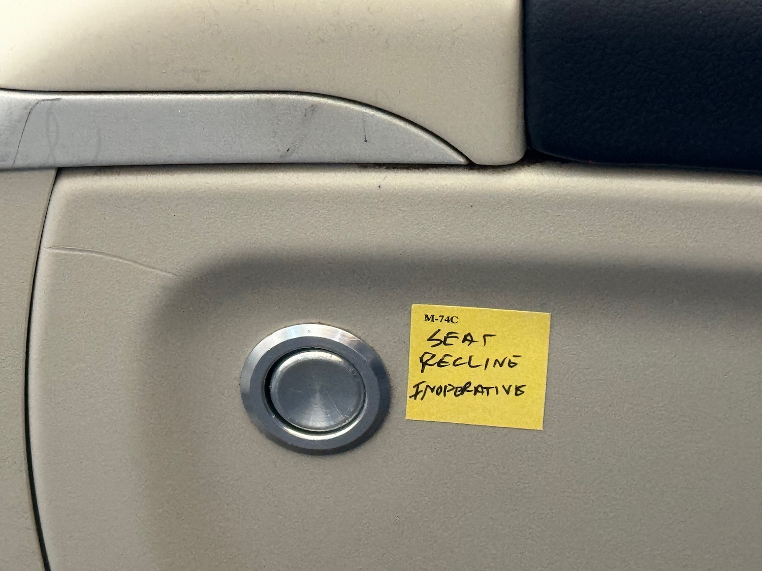 a yellow note on a door handle