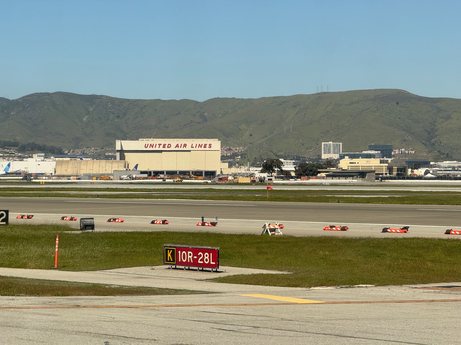 a runway with a building in the background