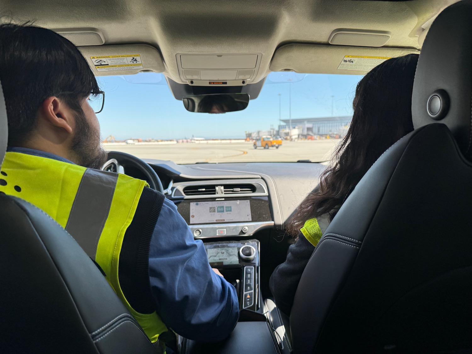 a man and woman in a car