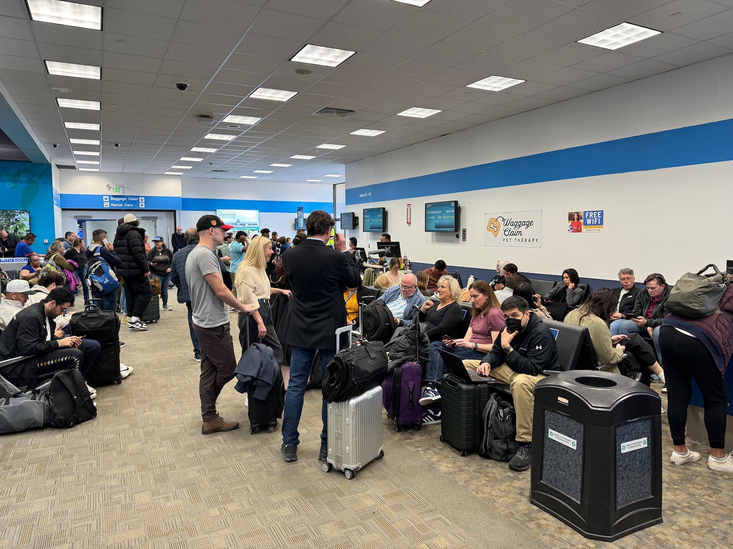 a group of people in a waiting room