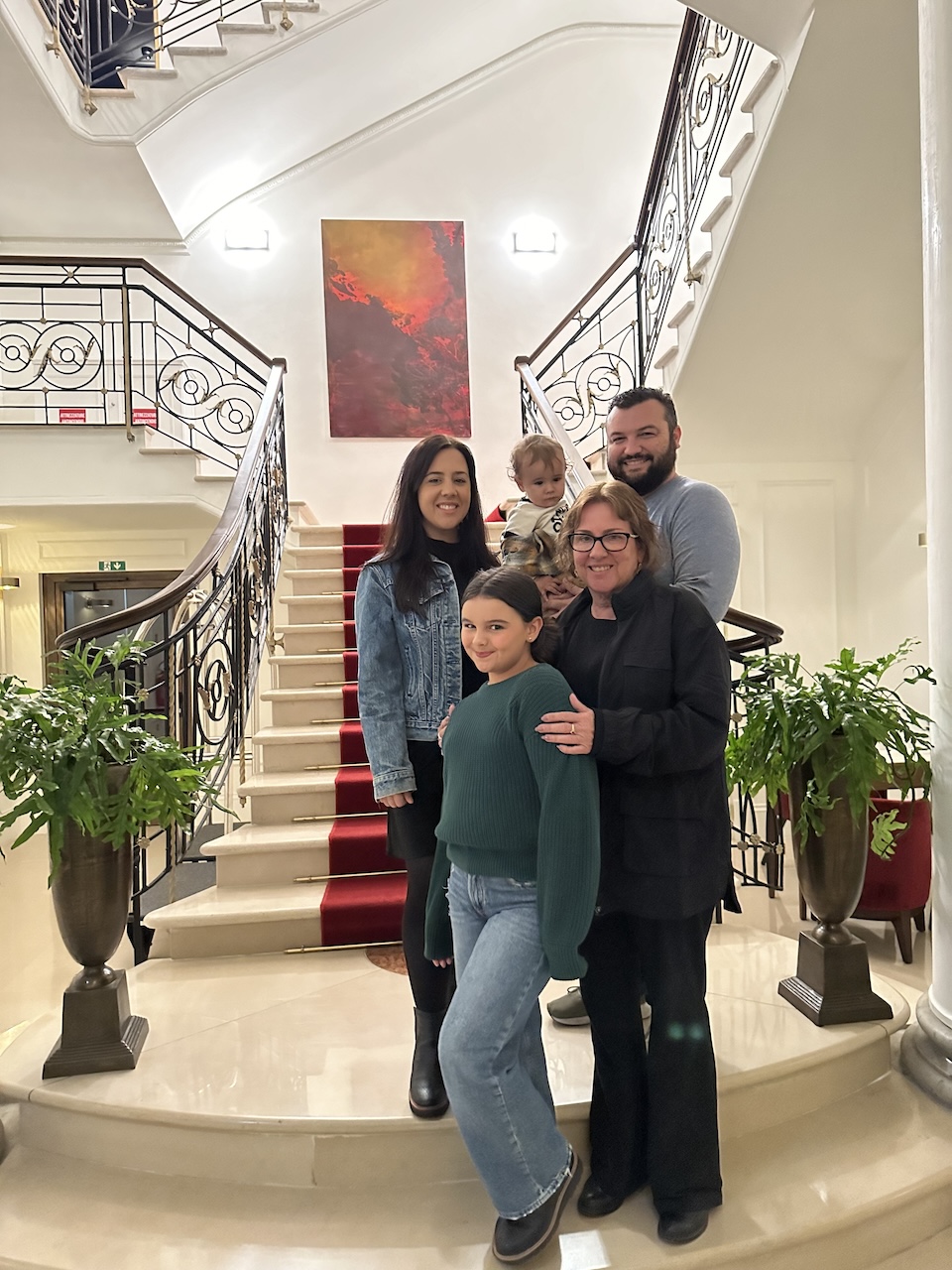 a group of people standing on a staircase