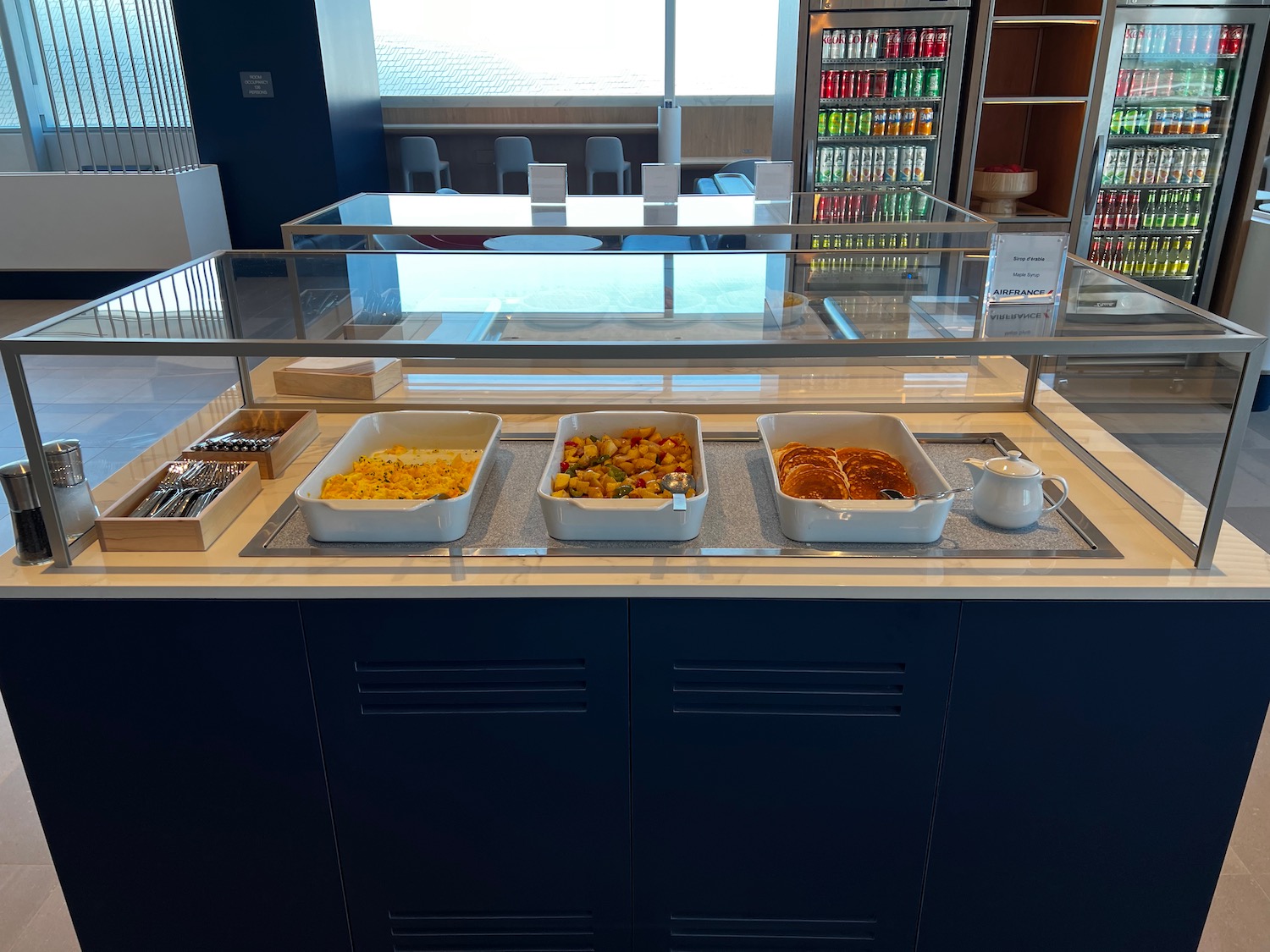 a buffet with food in containers