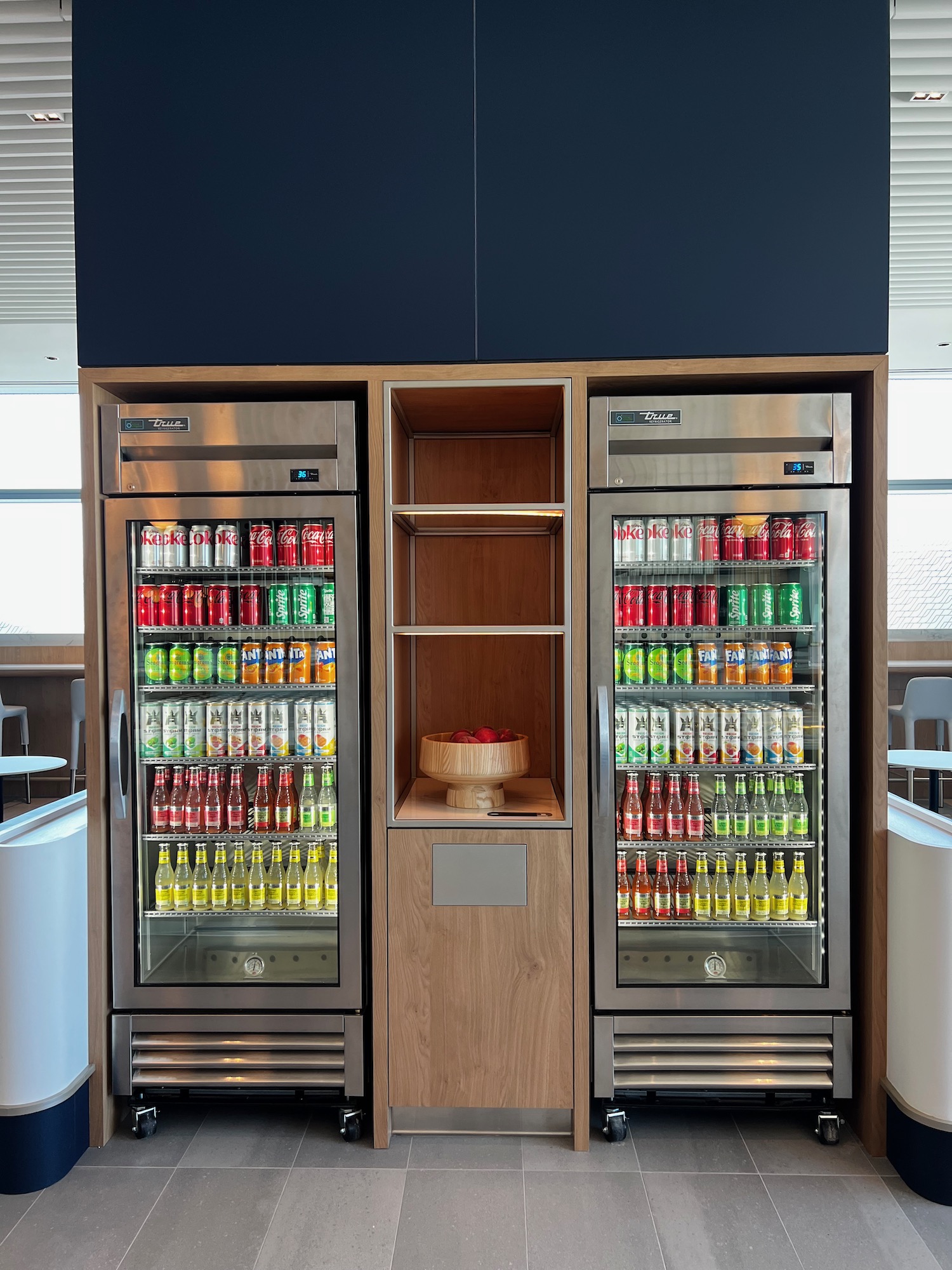 a beverage cooler with drinks in it