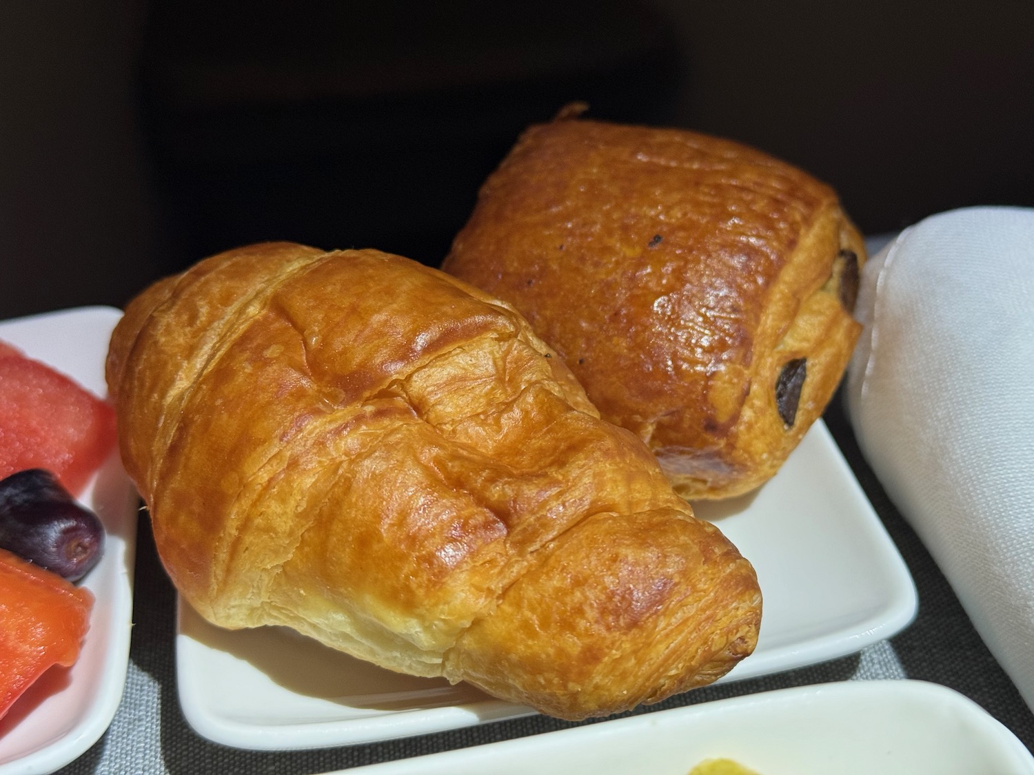 a plate of croissants