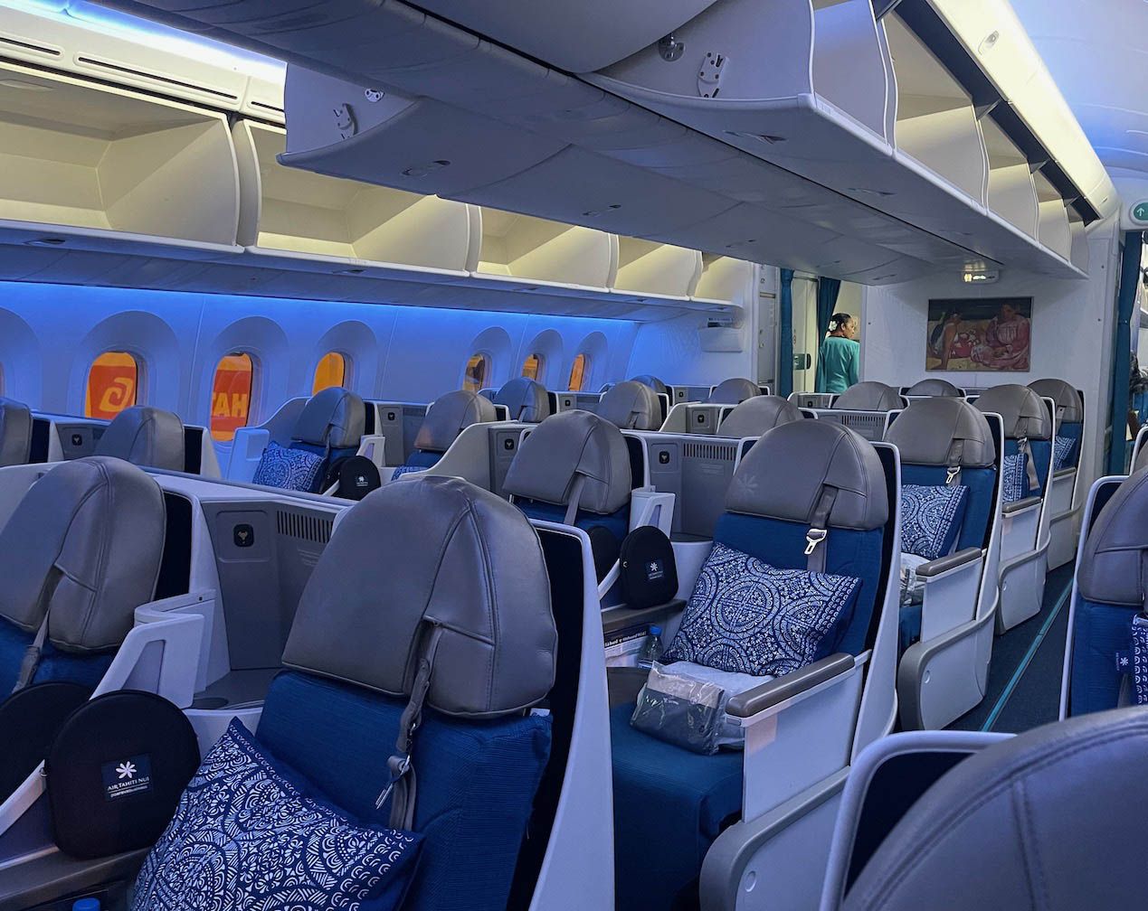 a plane with blue and white seats