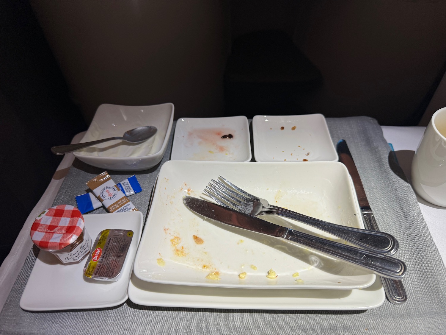 a table with plates and utensils