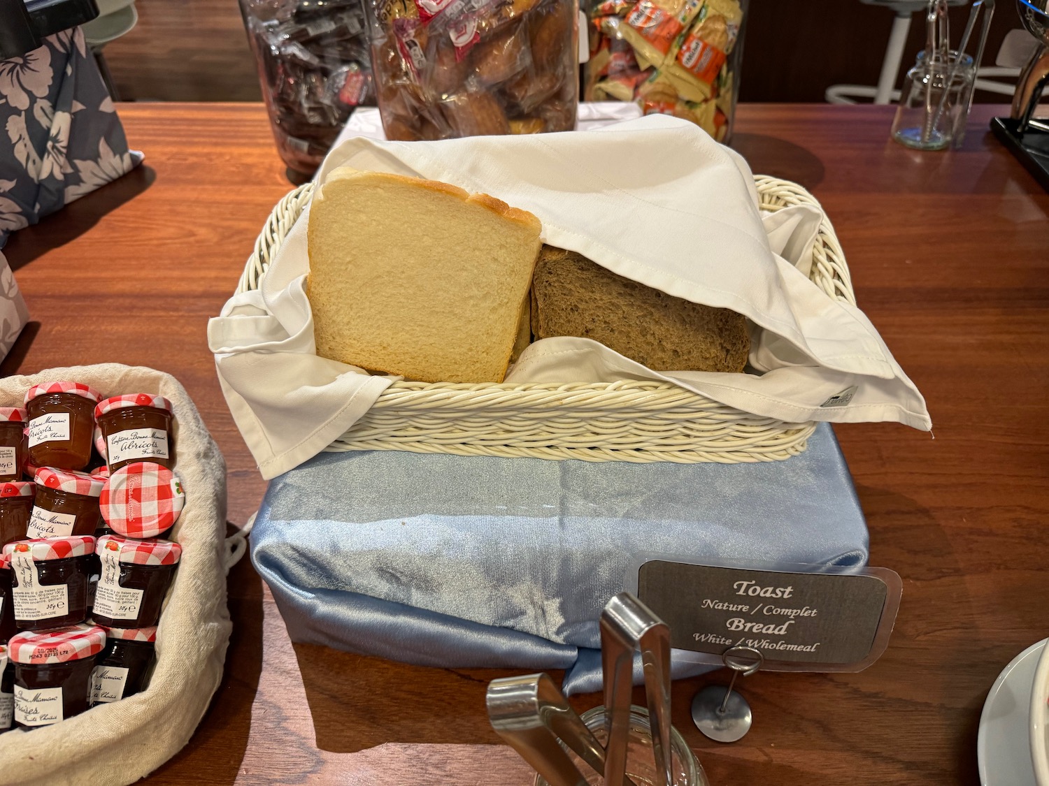 a basket of bread and a bag of bread