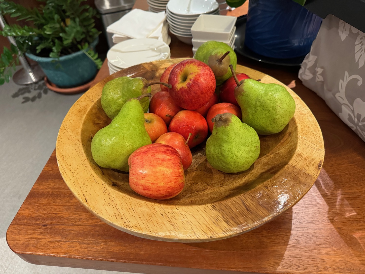 a bowl of fruit on a table