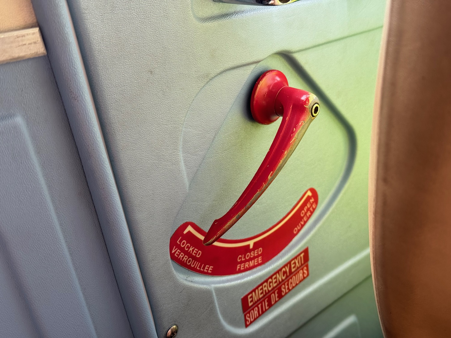 a red handle on a door