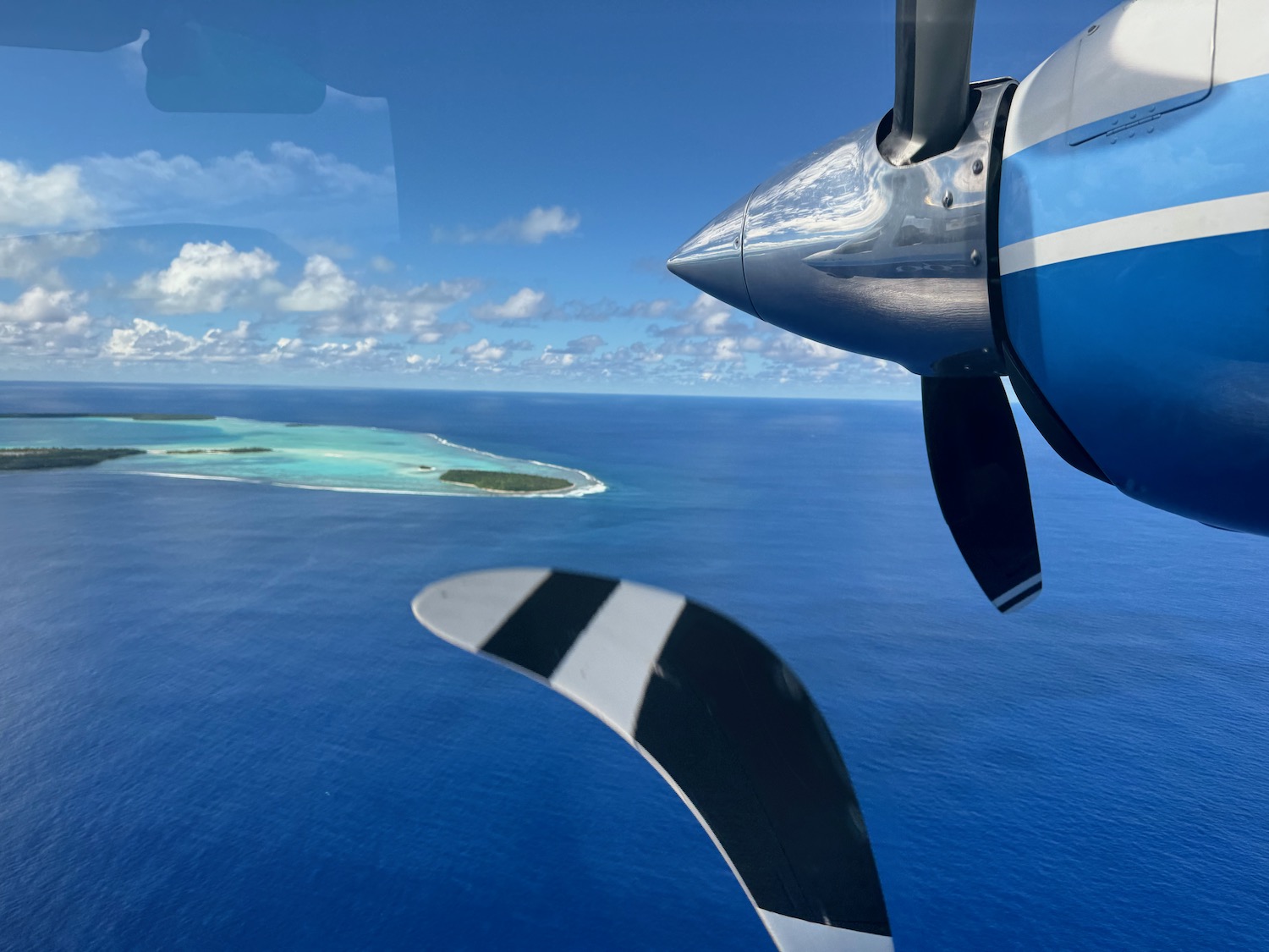 an airplane propeller and an island