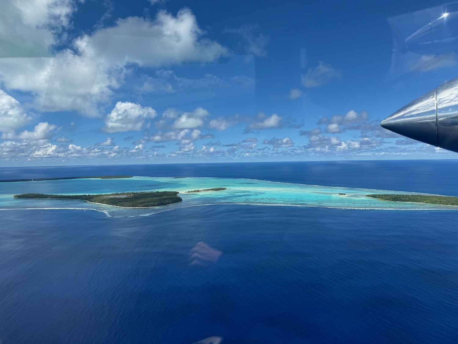 an aerial view of an island in the ocean