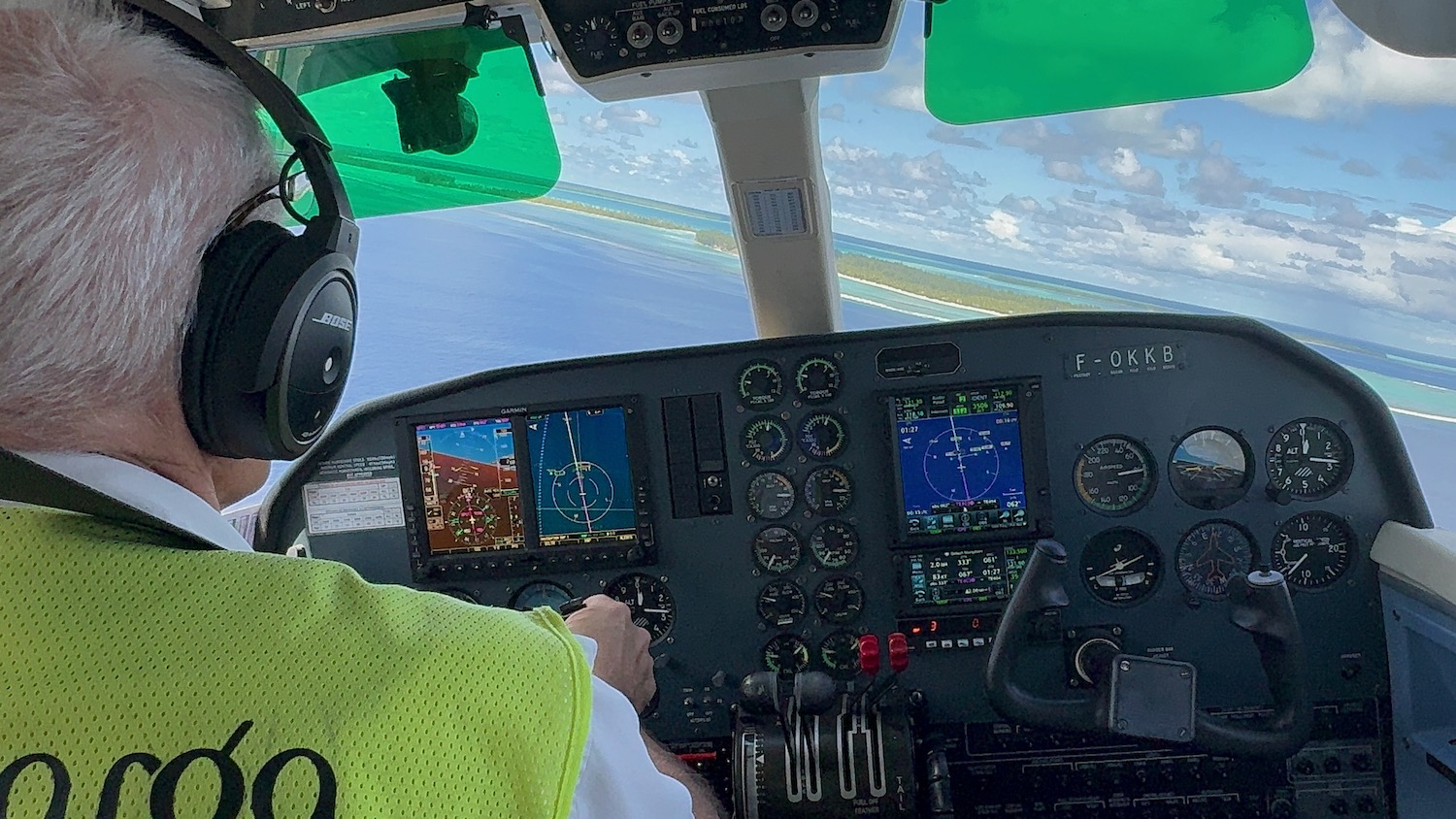 a person in a cockpit of a plane