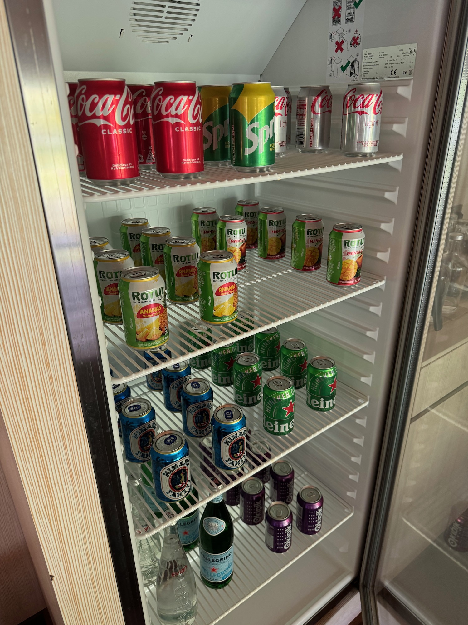 a refrigerator full of cans