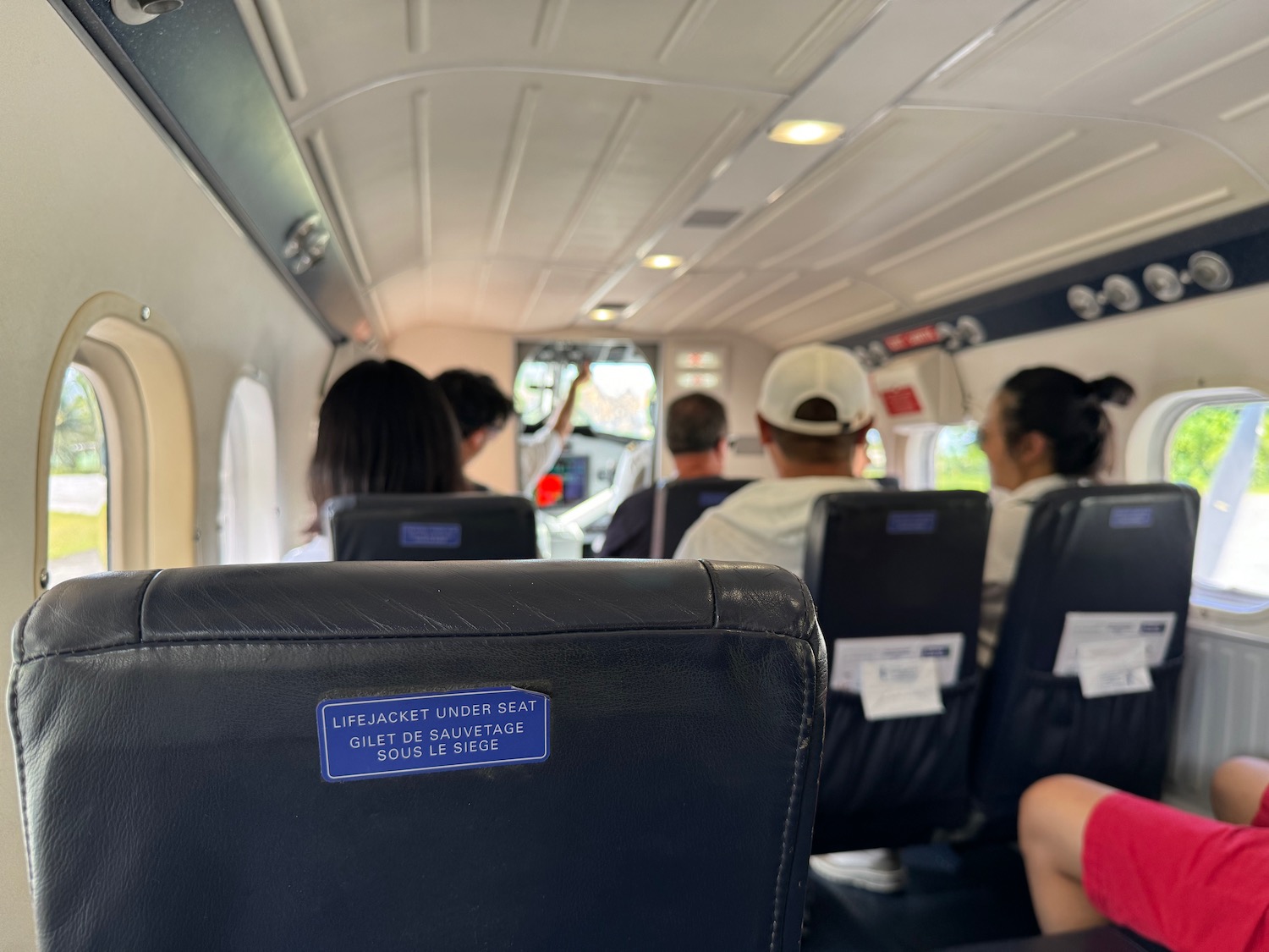 a group of people sitting in a plane