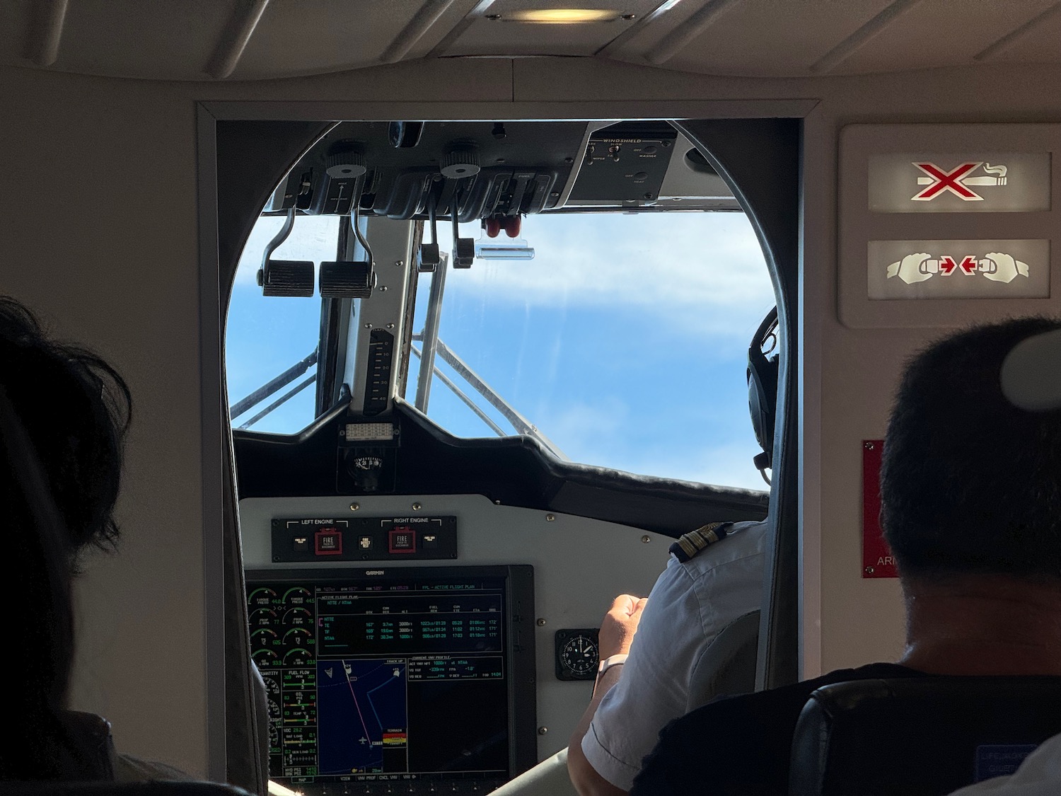 a man in a pilot's cockpit