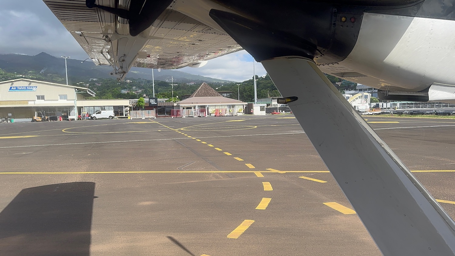 an airplane wing on a tarmac