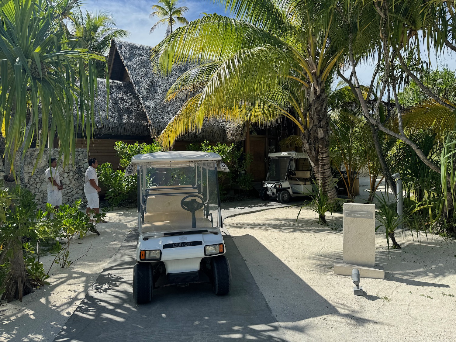 a golf cart parked in a parking lot