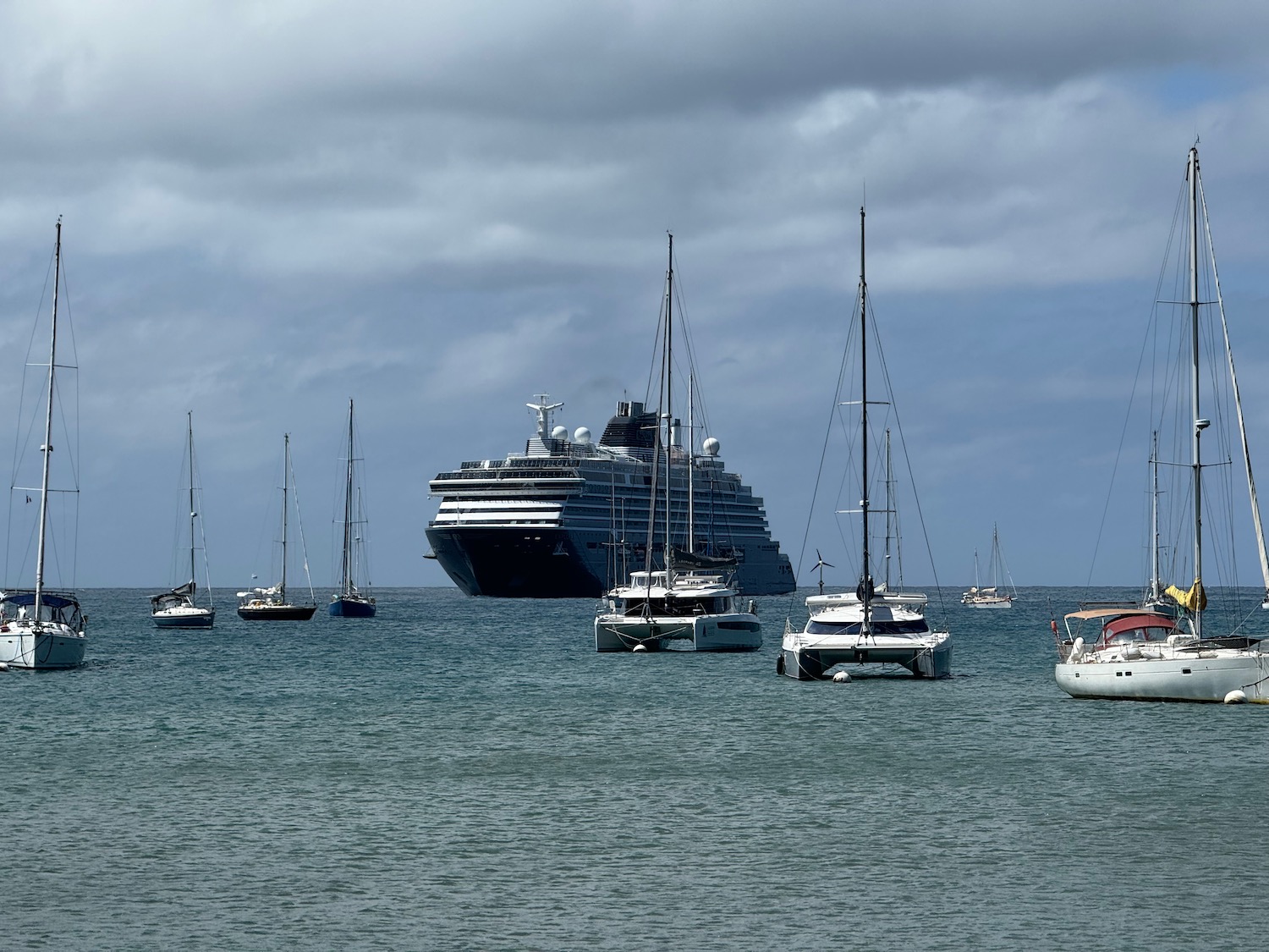 a large cruise ship in the middle of a body of water