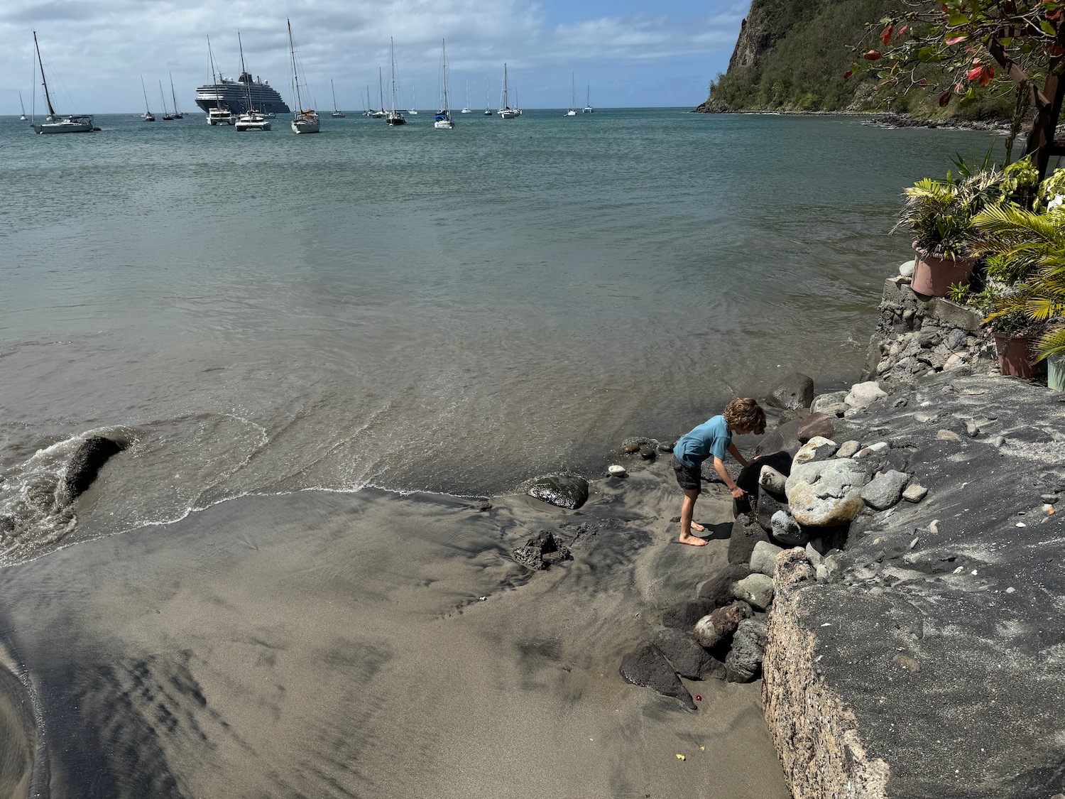 a boy playing on a beach