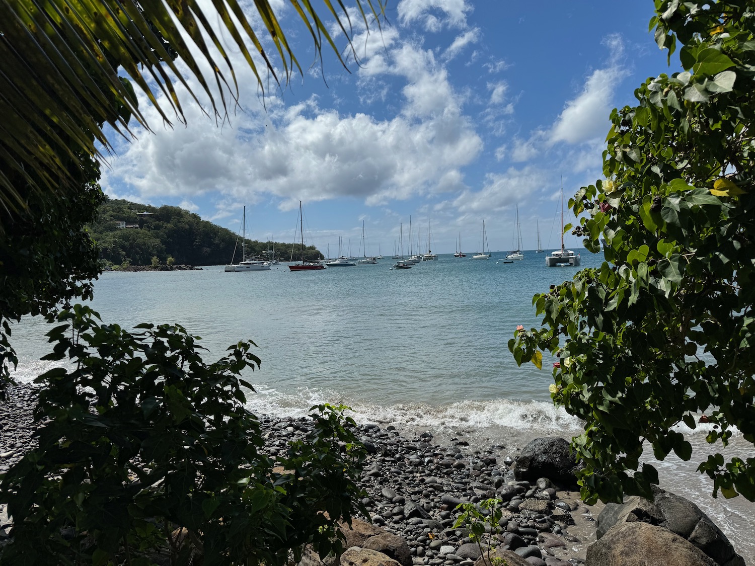 a view of a body of water with boats in the water