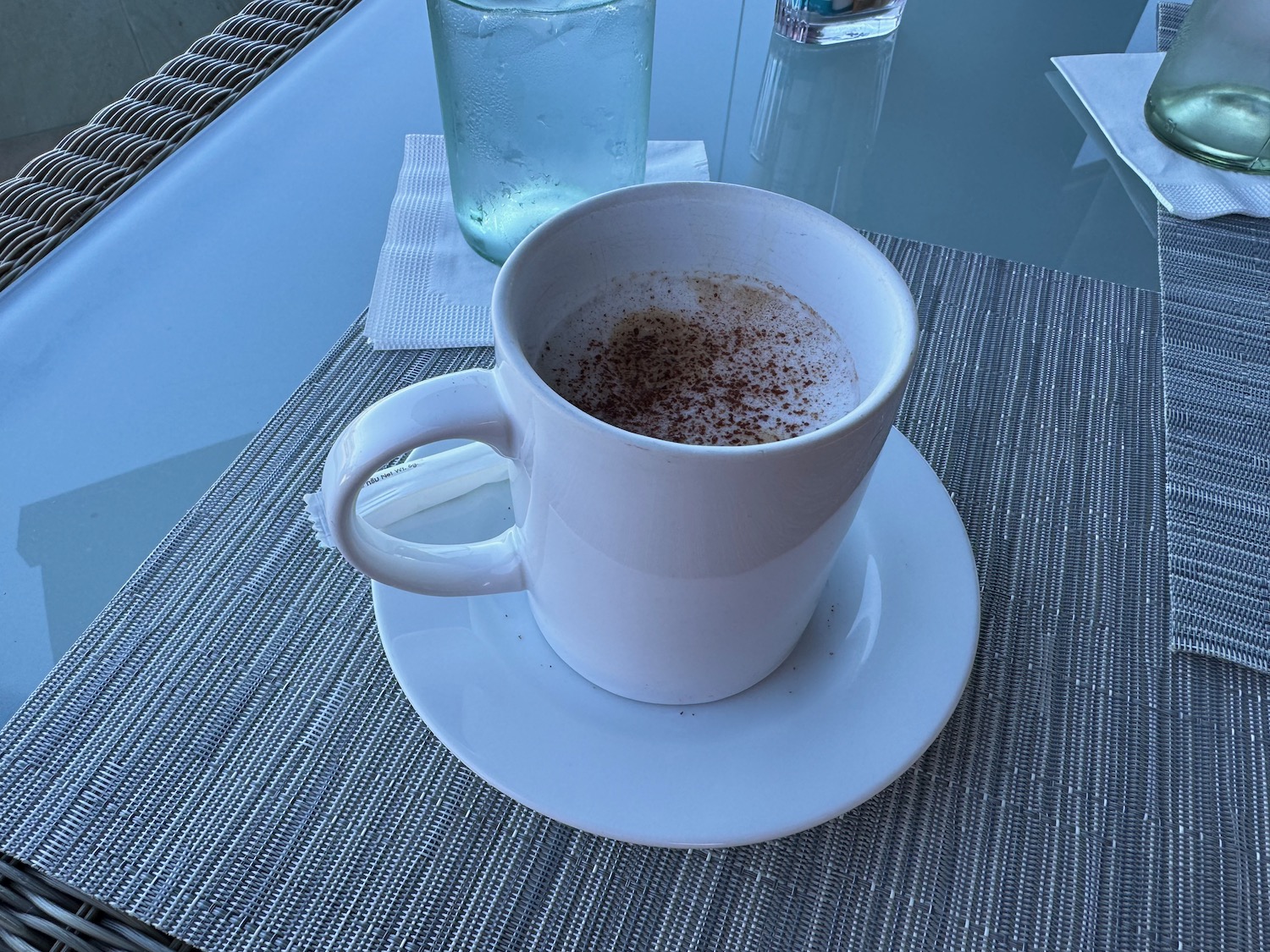 a cup of coffee on a table