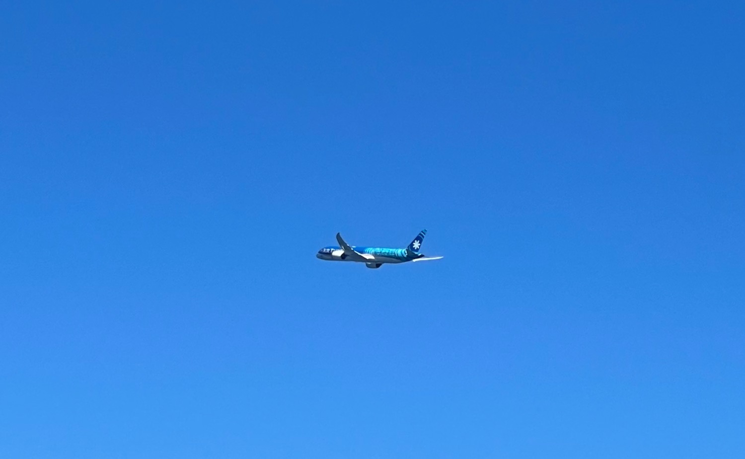 a plane flying in the sky