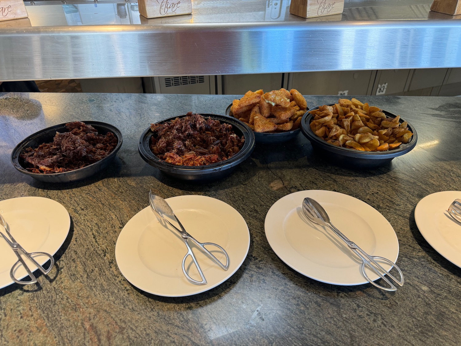 a group of bowls of food on a table