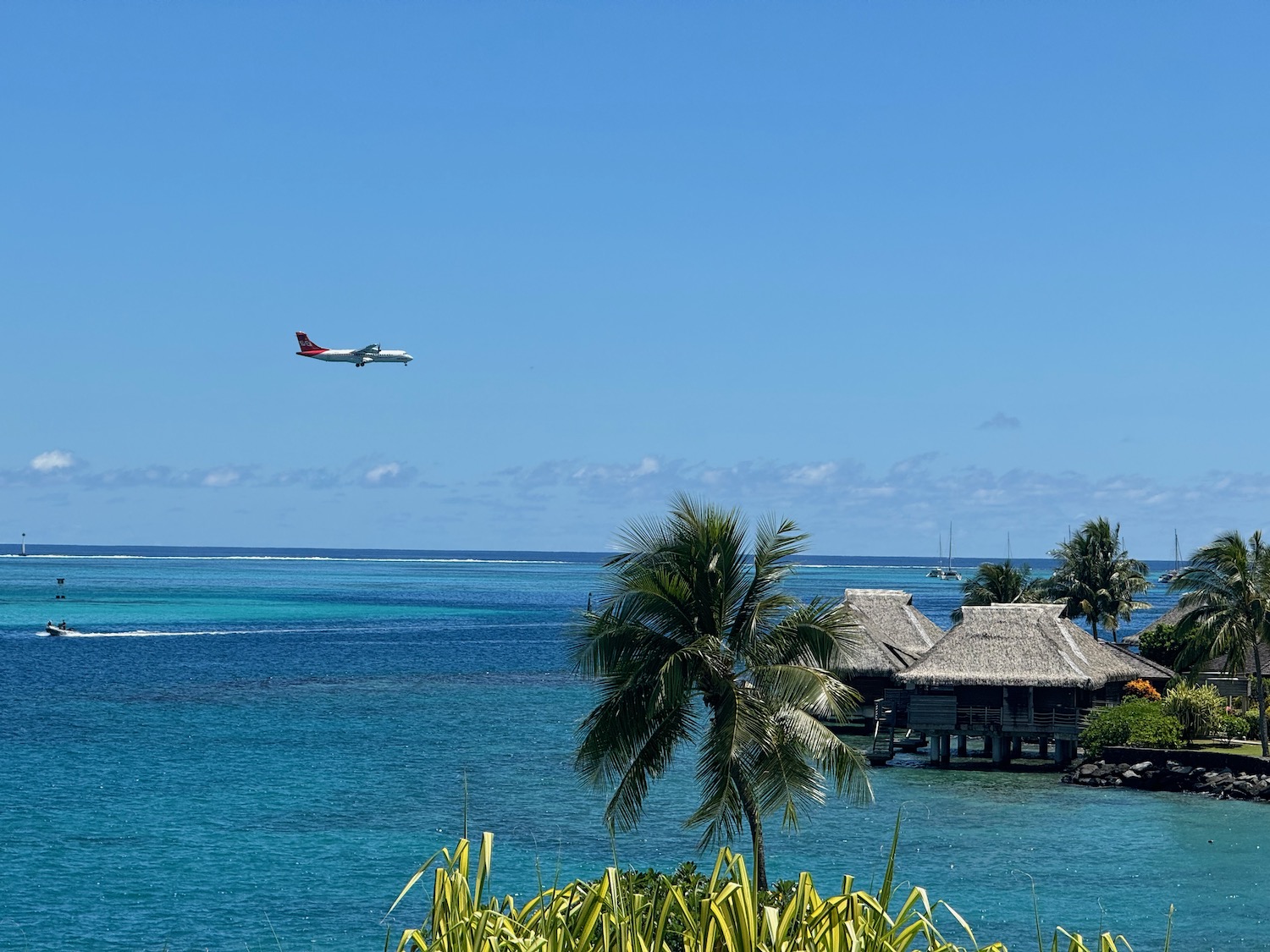 a plane flying over water