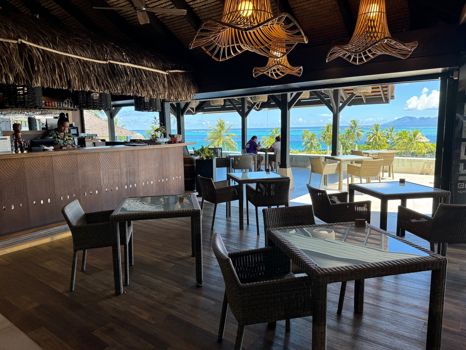 a restaurant with tables and chairs