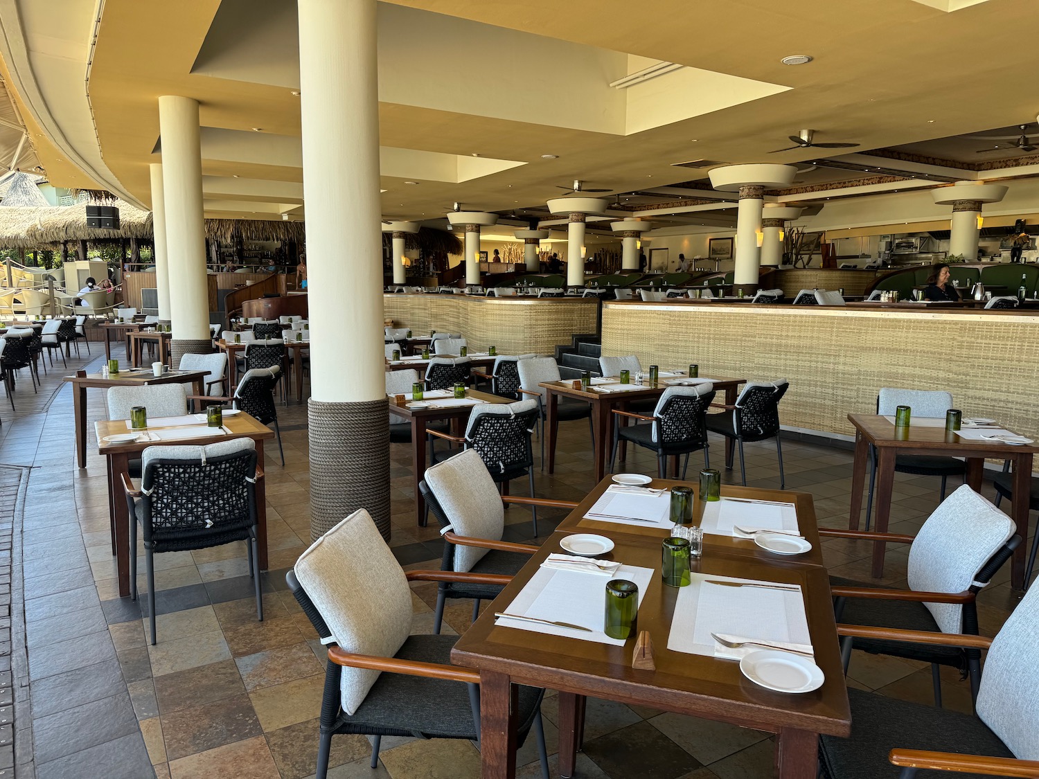 a restaurant with tables and chairs