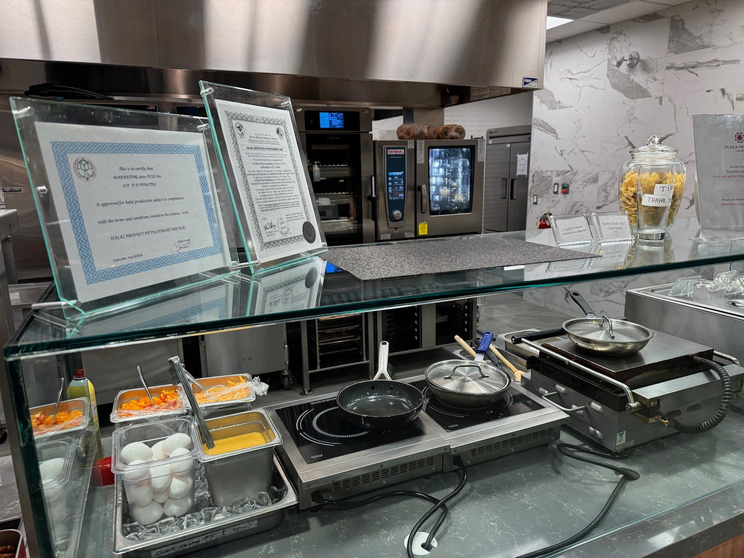 a kitchen with a glass counter top