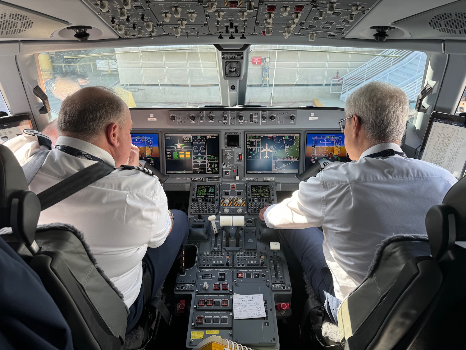 men in the cockpit of an airplane