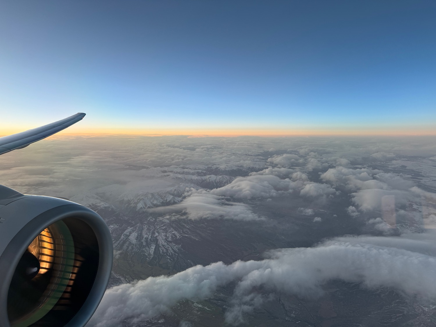 an airplane wing and the sky