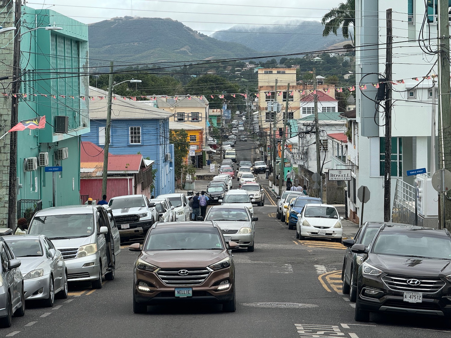 a street with cars and buildings