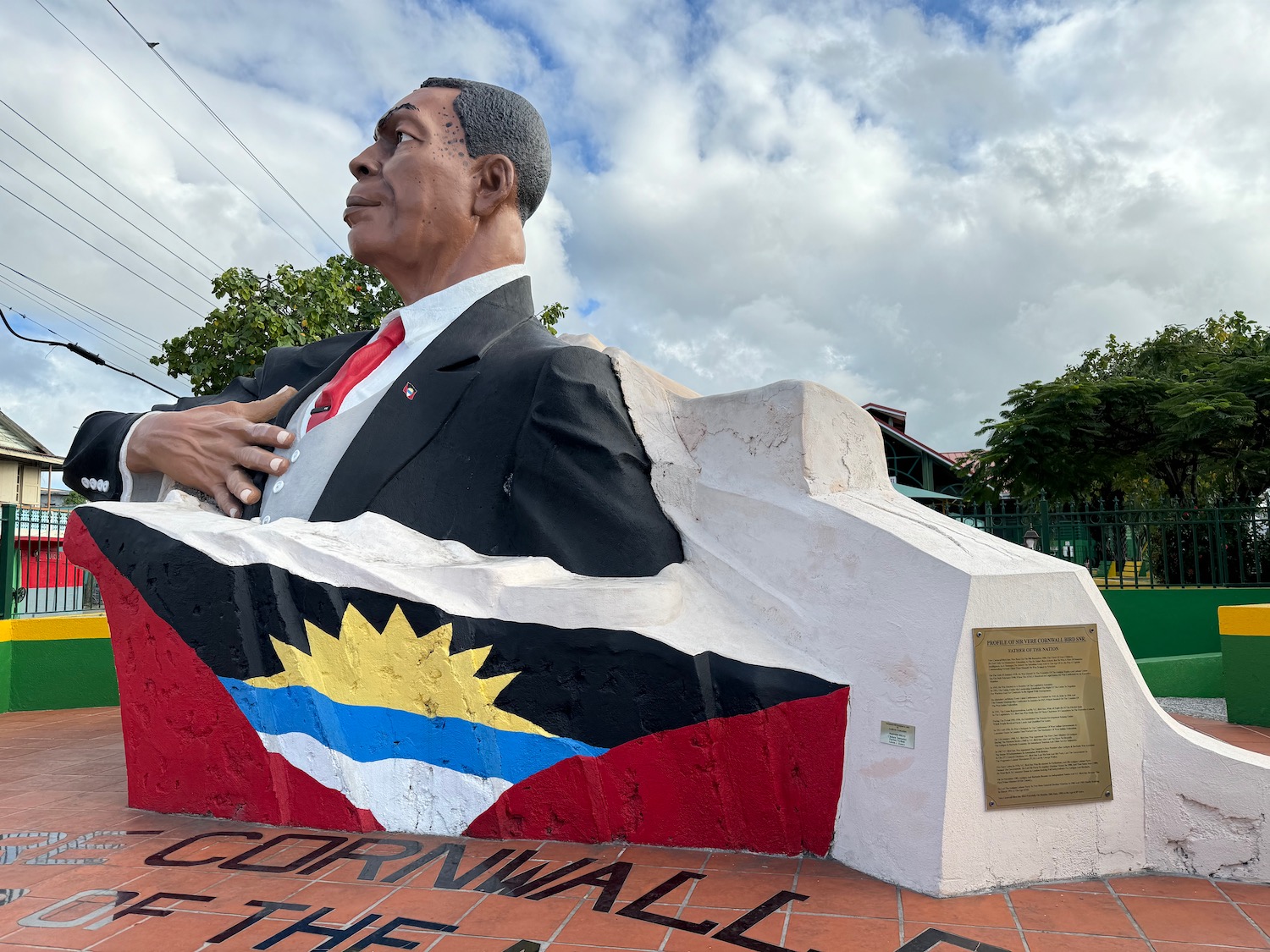 a statue of a man in a suit and tie