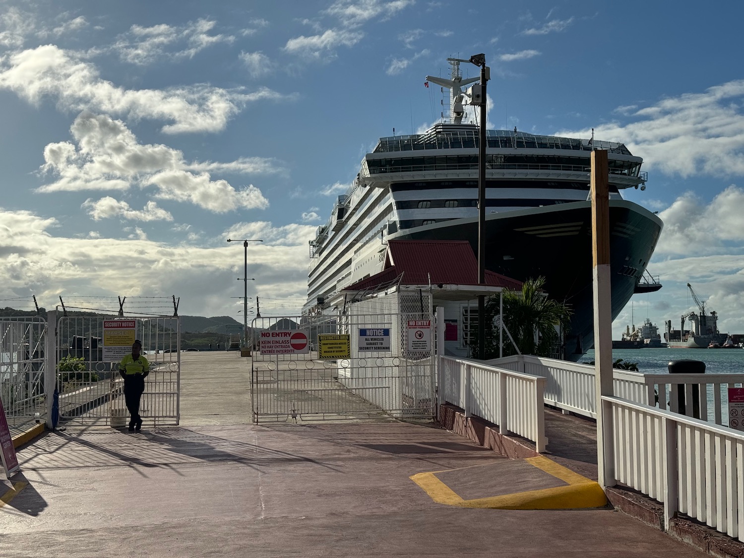 a cruise ship docked at a dock