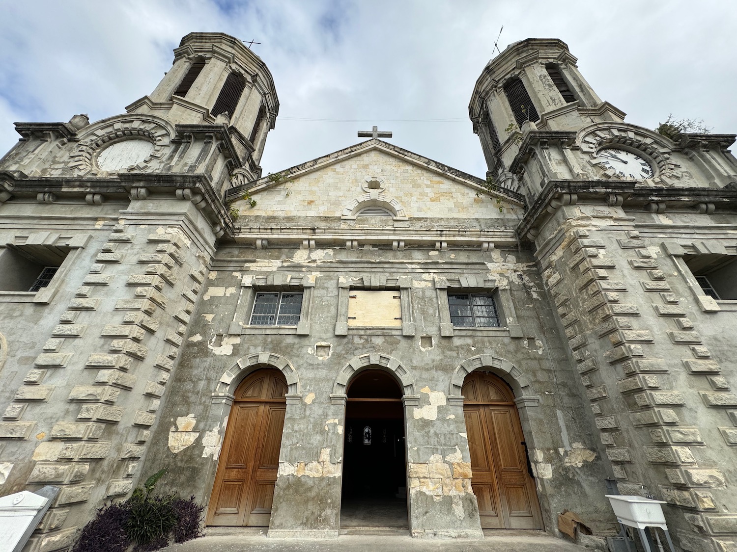 a stone church with two towers