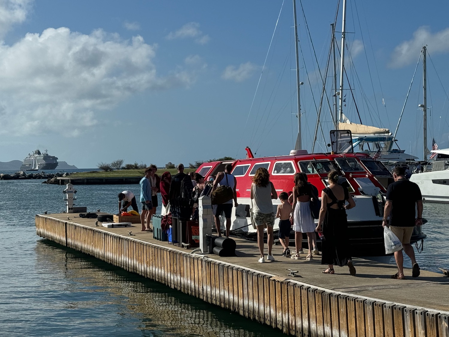 a group of people standing on a dock