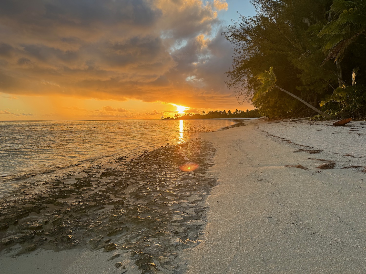 a sunset over a beach